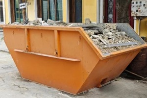 construction waste in a dumpster