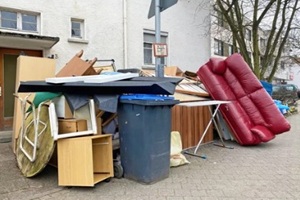 trash outside Chesapeake home waiting for bulk trash pickup