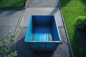 empty dumpster outside a home