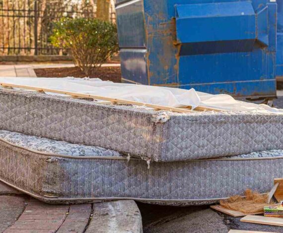 residents still illegally dump bulk items by the residential trash containers in Virginia Beach, VA