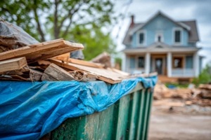 large construction dumpster filled with wooden debris