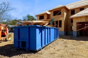 construction trash dumpsters in an metal container, home house renovation
