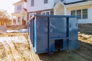 blu dumpster, recycle waste and garbage bins near new construction site of appartment houses building