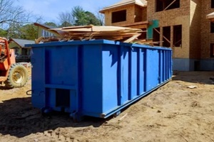 construction trash dumpsters in an metal container, home house renovation