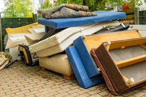 bulky waste reduction, large pile discarded furniture and mattress, Housing change old household items recycling,
