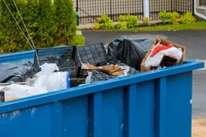 construction trash dumpsters in an metal container, home house renovation