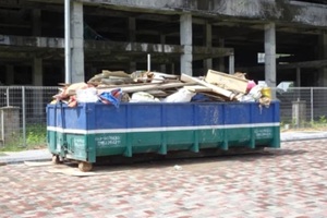 construction wasted disposal bin used to collect rubbish and unused material at the construction site