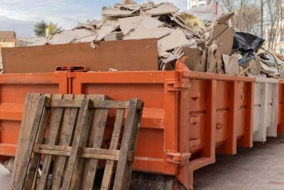 drywall and other rubble near a construction site - construction debris removal