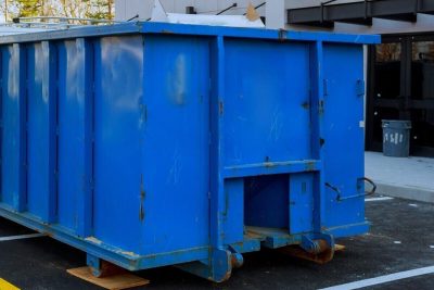 dumpsters being full with garbage