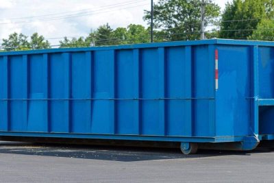 large iron dumpster garbage metal recycle in Virginia Beach, VA parking lot